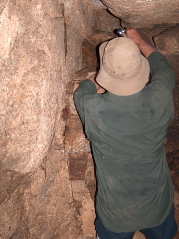 Brian inspects a cluster of rocks for a possible secret stash
 ;-)
